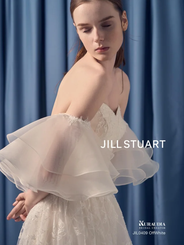 -ひよしや新作ドレス試着会-
12/6(土) Start

『JILL STUART 』

JILL0409 ow

ポピー柄のチュールレースが印象的なスレンダードレス。
チュールレースの柄が、ほのかに華やかさを演出してくれます。
取り外し可能のオーガンジーの袖フリルで着こなしのアレンジが出来ます。

気になるドレスがございましたら、
保存をタップ！ひよしやスタイリストにお見せください^_^

Tel. 088-882-9611
HP. www.hiyoshiya.co.jp
( ページ上部URLから飛んで頂けます )

・
#ジルスチュアート#JILLSTUART
#ウェディング#ウェディングドレス#白ドレス#カラードレス #運命の一着#ドレス迷子#ドレス選び#花嫁#結婚式#結婚準備#結婚式準備#プレ花嫁#ドレスショップ#ウェディングドレス試着 #高知#高知婚#高知ウェディング#高知ウエディング#高知ウェディングドレス#高知ウェディングフォト#高知ドレスショップ#高知結婚式#高知結婚式場 #ひよしや#hiyoshiya#weddingdress#colordress  #ひよしや高知